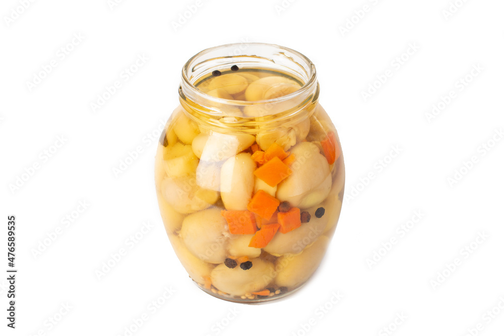 pickled mushrooms in a glass jar isolated pickled mushrooms in a glass jar isolated