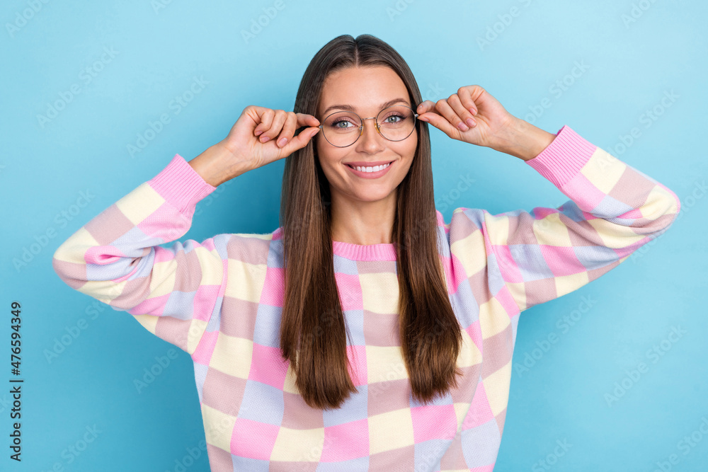 Photo of charming cute lady eye examination concept wear spectacles pullover isolated blue color background