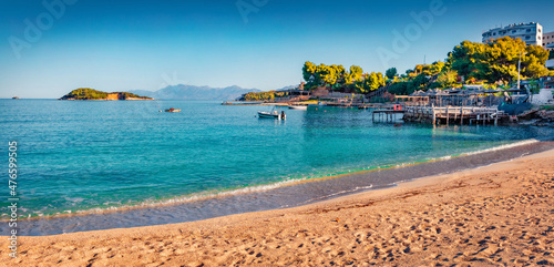 Panoramic spring view of Ksamil resort. Azure seascape of Ionian sea. Calm outdoor scene of Albania, Europe. Vacation concept background.