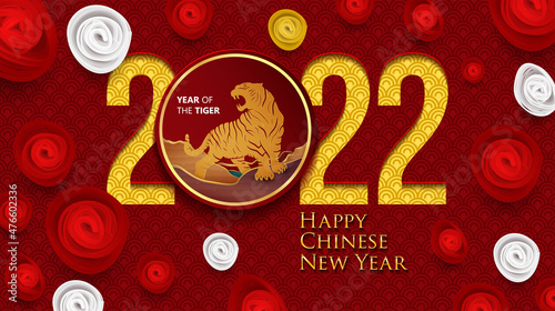 2022 Chinese New Year Greeting Card. Year of the Tiger. Chinese New-Year. Paper cut with Tiger and Flowers. gong xi fa cai 2022. Hieroglyph - Zodiac Sign Tiger. Place for your Text.