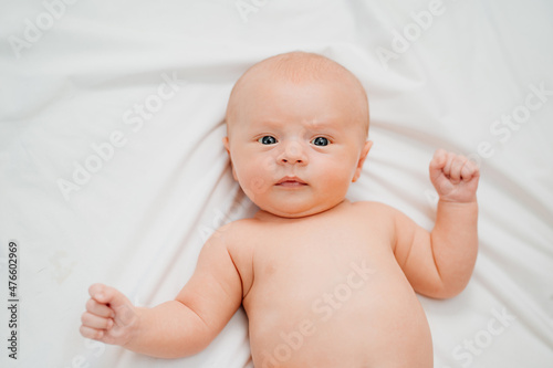 top view. cute baby on a white sheet. pediatrics