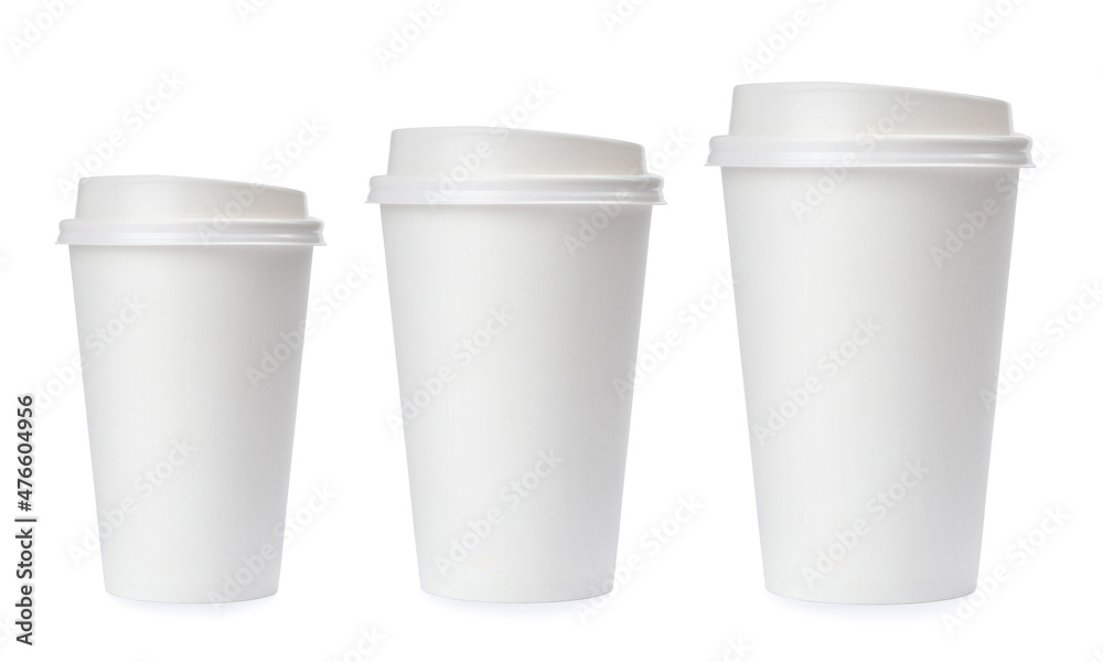 Paper coffee cups of different sizes on white background, collage Paper coffee cups of different sizes on white background, collage