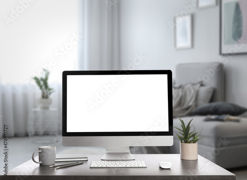 Workplace with modern computer on table indoors. Mockup for design