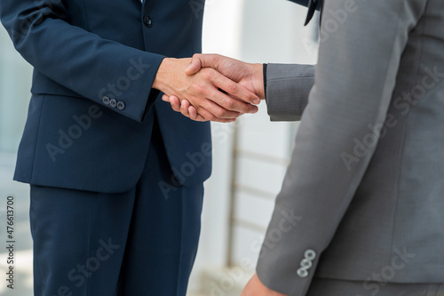Close-up hand of Businessman handshake for teamwork of business merger partnership and business deal,successful negotiate,hand shake © mnirat