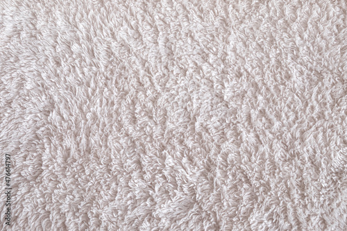 Soft Fur white carpet. wool sheep fleece closeup texture background