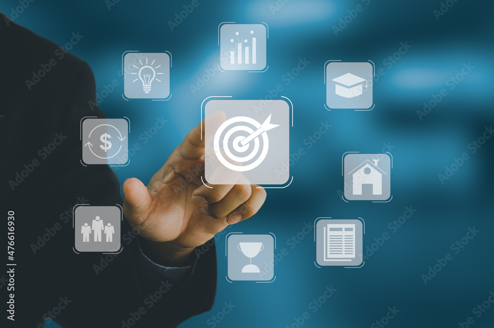 businessman hand touching a virtual screen. Planning the way to achieve the goal to success. Vision and concept of business goals Strategy development, learning, work, business finance, concepts. businessman hand touching a virtual screen. Planning the way to achieve the goal to success. Vision and concept of business goals Strategy development, learning, work, business finance, concepts.