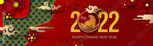 2022 Chinese New Year Greeting Card. Year of the Tiger. Chinese New-Year. Paper cut with Tiger and Flowers. gong xi fa cai 2022. Hieroglyph - Zodiac Sign Tiger. Place for your Text.