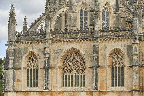 detail of the western façade of the Batalha Monastery facing the large square in Batalha, Portugal © hectorchristiaen