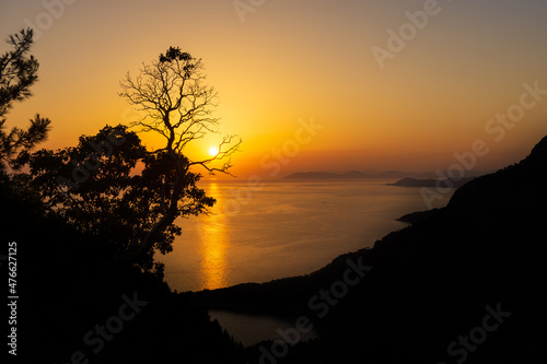 Oludeniz landscape beautiful sunset lagoon in sea view of beach, Turkey. With city lights, beach and mountain is best touristic destination of Fethiye. High quality resulation puzzle wallpaper