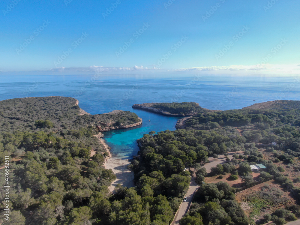 Cala Sa Nau Mallorca. Aerial view of the seacoast of the beach in Mallorca with torquoise water colour. Amazing photo of the beach. Concept of summer, travel, relax and holiday and vacation