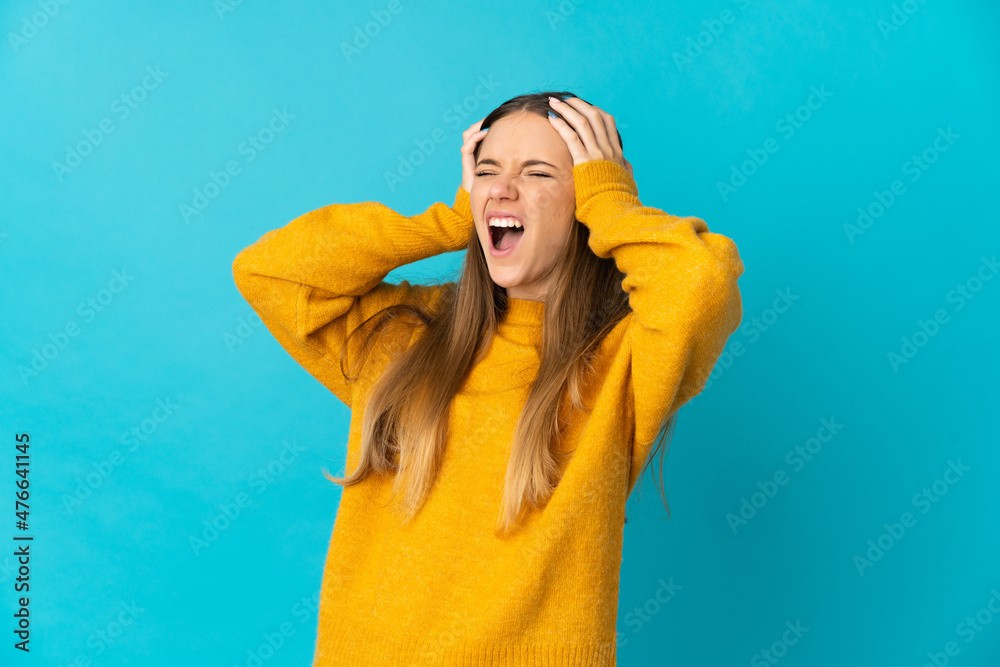Young Lithuanian woman isolated on blue background stressed overwhelmed Young Lithuanian woman isolated on blue background stressed overwhelmed