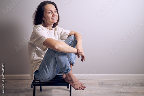 beautiful woman sitting on chair