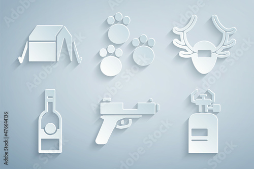Set Pistol or gun, Deer antlers on shield, Bottle of vodka, Camping gas stove, Paw print and Tourist tent icon. Vector