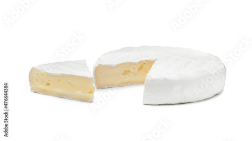 Tasty cut brie cheese on white background photo