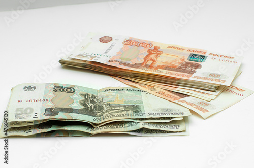 Russian money, 50 rubles and 5000 rubles. Poverty, inflation, saving money.