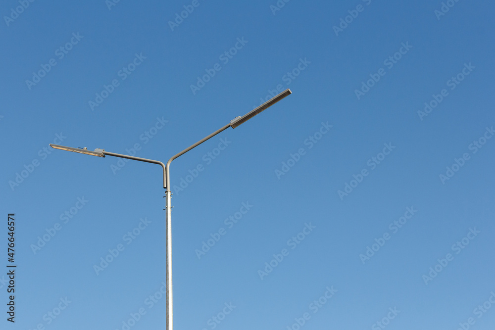Street lamp. A modern street LED lighting pole. Modern LED lighting for streets and roads. Street lamp. A modern street LED lighting pole. Modern LED lighting for streets and roads.