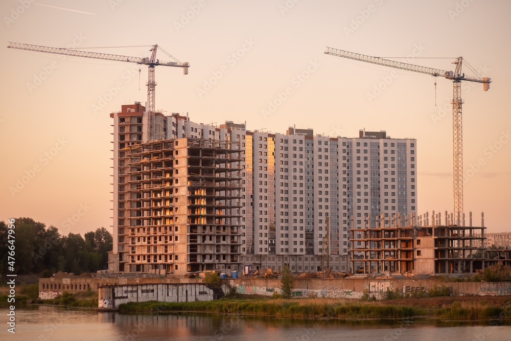 Kazan, Russia - June 8, 2021: Construction crane and a building house