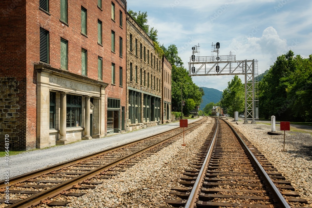 Fototapeta premium Railroad tracks and historic buildings in Thurmond, a ghost town in the New River Gorge of West Virginia
