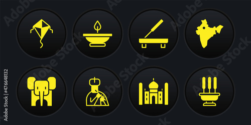 Set Elephant, India map, Indian man plays flute, Taj Mahal, Scented spa stick, Aroma lamp, Incense sticks and Kite icon. Vector