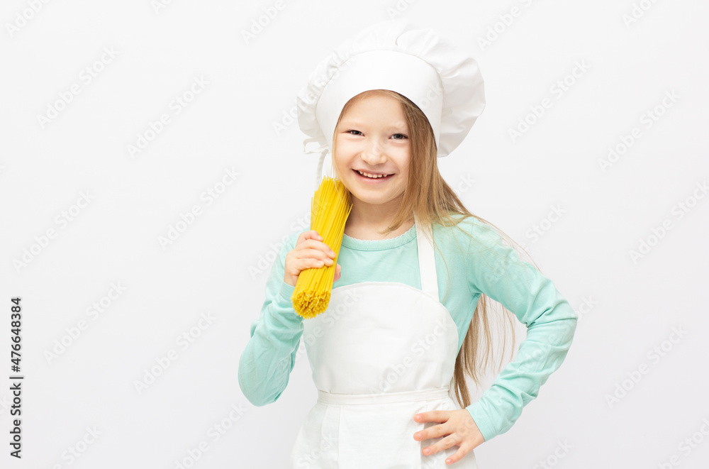 Beautiful little girl in chef uniform isolated on white Beautiful little girl in chef uniform isolated on white