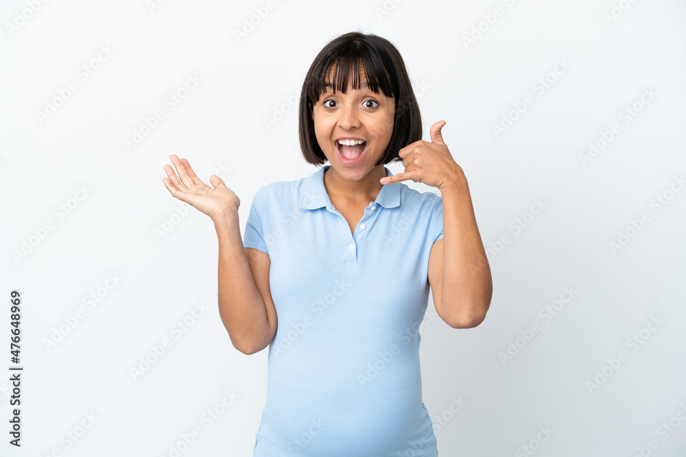 Pregnant woman over isolated white background making phone gesture and doubting Pregnant woman over isolated white background making phone gesture and doubting