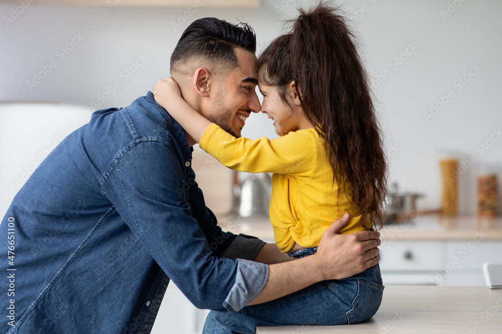 © Prostock-studio - Happy Father's Day. Cute Little Arab Girl Embracing Her Happy Dad © Prostock-studio - Happy Father's Day. Cute Little Arab Girl Embracing Her Happy Dad