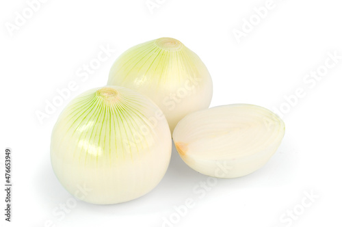 Peeled onions on a white