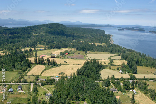 Aerial photo of the northeastern side of Saltspring Island with Trincomali Channel and the Secretary Islands in the background, Saltspring Island, British Columbia, Canada photo