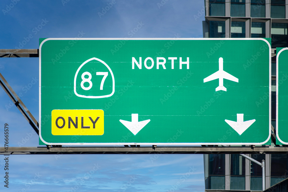 Highway 87 North overhead road sign in Downtown San Jose with the direction to the airport Highway 87 North overhead road sign in Downtown San Jose with the direction to the airport