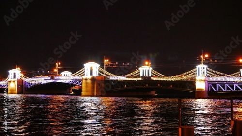 illumination and decoration of the bridge on a festive night