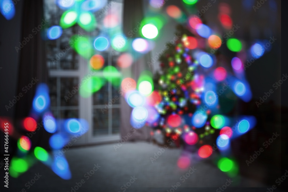Christmas lights string on wall background Christmas lights string on wall background