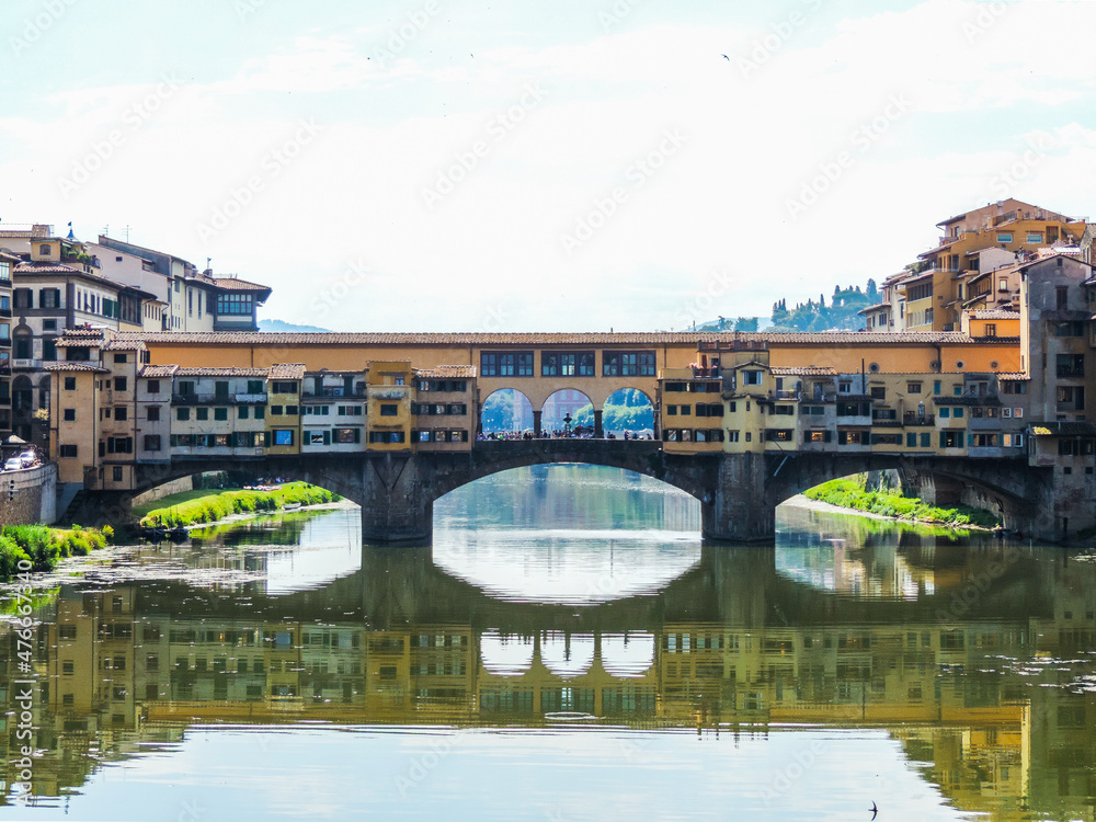 view of Ponte Vecchio and Florence buildings from Ponte Santa Trinita- Florence, Italy