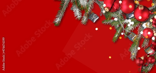 Christmas banner with fir branches  lights and new year decorations.