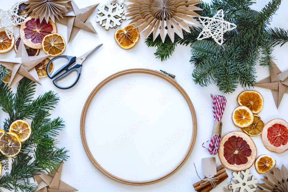Process diy a Christmas wreath from Nordman fir branches. Zero waste decoration concept.