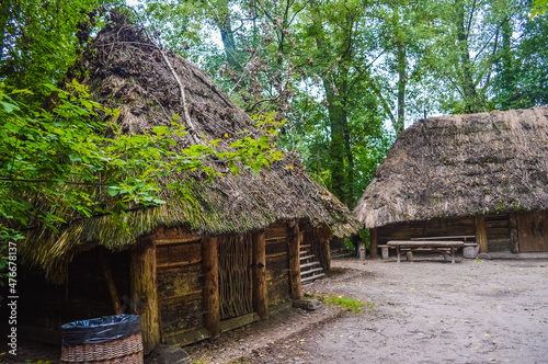 Ancient wooden house in Biskupin village, Poland photo