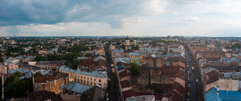 Obraz premium Beautiful aerial view of the Chernivtsi city from above Western Ukraine. City council on sunset