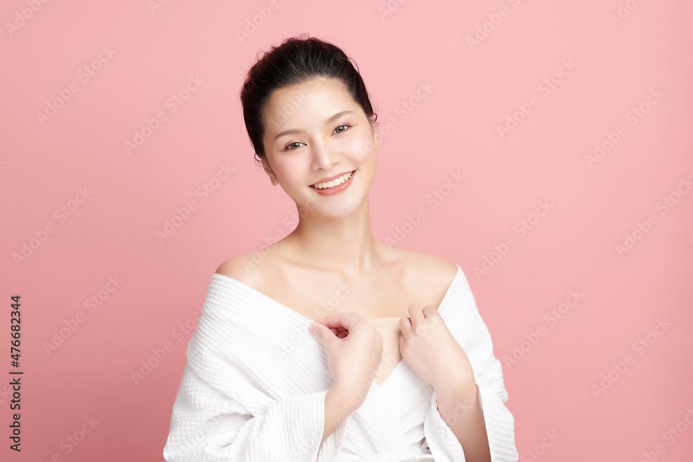Beautiful young asian woman with clean fresh skin on pink background, Face care, Facial treatment, Cosmetology, beauty and spa, Asian women portrait. Beautiful young asian woman with clean fresh skin on pink background, Face care, Facial treatment, Cosmetology, beauty and spa, Asian women portrait.