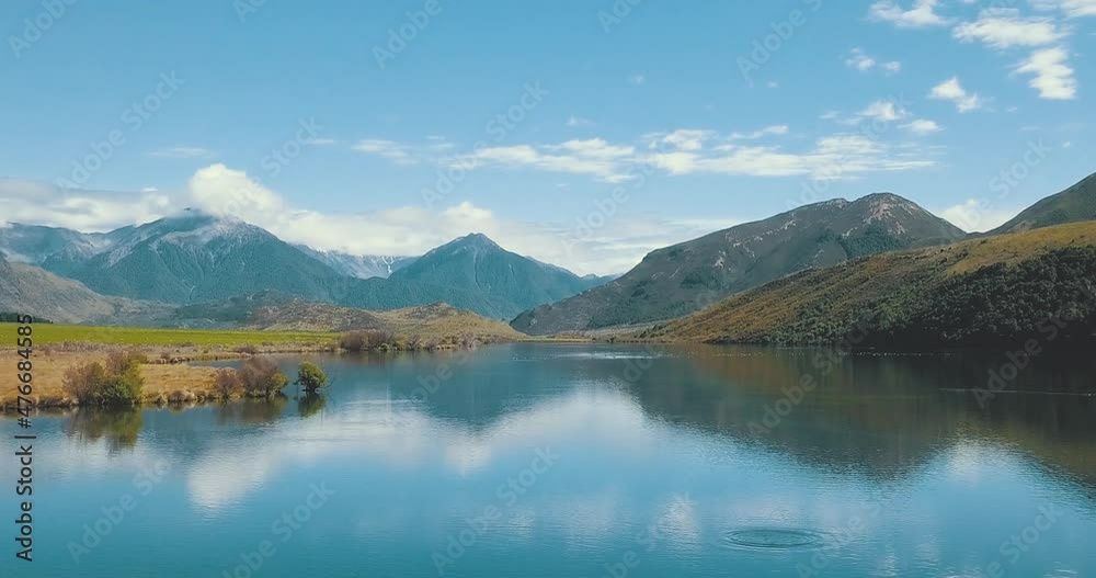 Zooming Out Drone View Of Lake Grasmere Near Cass And Highway 73, New Zealand, Fishing Paradise - Dolly Shot Zooming Out Drone View Of Lake Grasmere Near Cass And Highway 73, New Zealand, Fishing Paradise - Dolly Shot