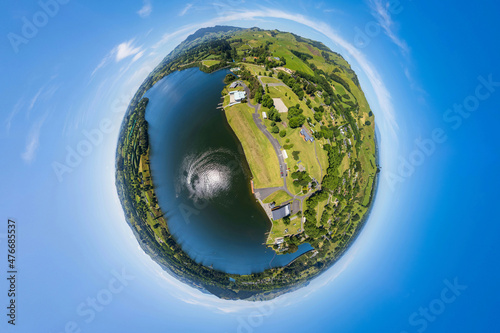 Fototapeta Naklejka Na Ścianę i Meble -  Aerial drone tiny planet globe sphere view over Lake Karapiro, in the Waikato region of New Zealand