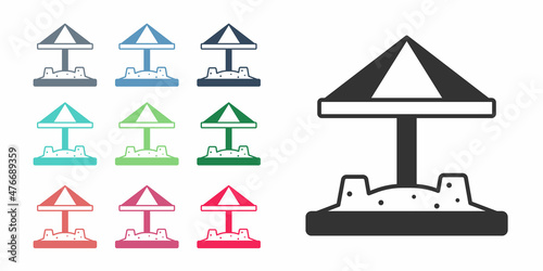 Black Sandbox for kids with sand and umbrella icon isolated on white background. Set icons colorful. Vector