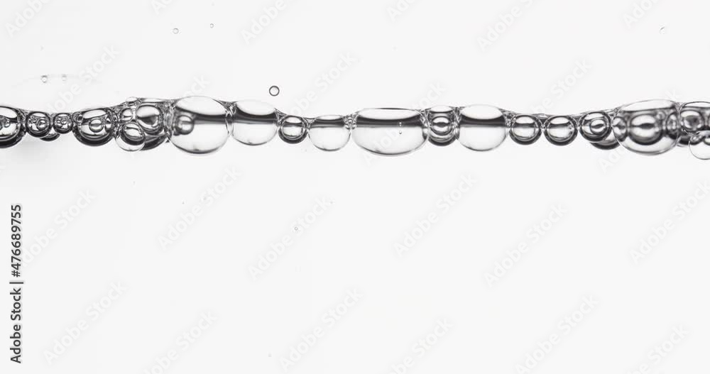 Bubbles In A Row Moving And Popping Along Water Surface Bubbles In A Row Moving And Popping Along Water Surface