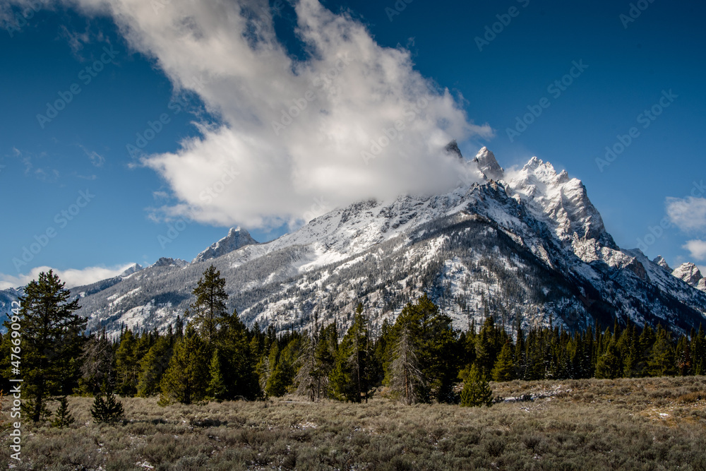 Alpine clouds in a mountain peak