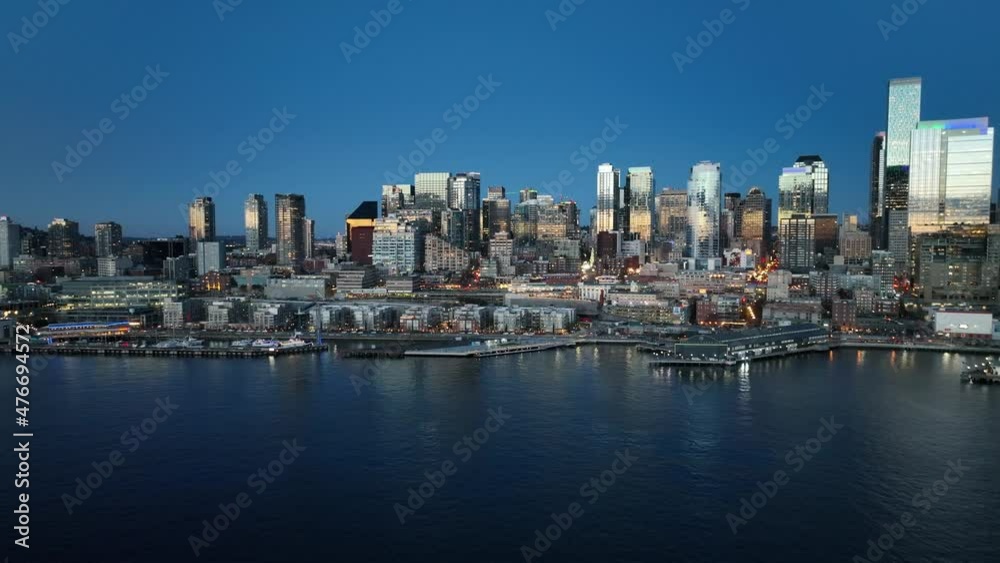 Cinematic 4K aerial drone night trucking shot of the Space Needle, Alaskan Way waterfront with Pike Place, The Seattle Great Wheel, Aquarium in Elliott Bay downtown Seattle Washington Cinematic 4K aerial drone night trucking shot of the Space Needle, Alaskan Way waterfront with Pike Place, The Seattle Great Wheel, Aquarium in Elliott Bay downtown Seattle Washington