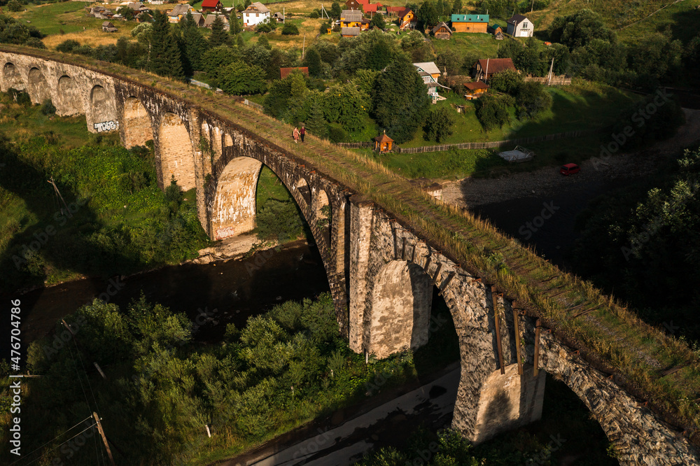 Fototapeta premium The largest and oldest viaduct in Ukraine, a brick and old railway bridge.