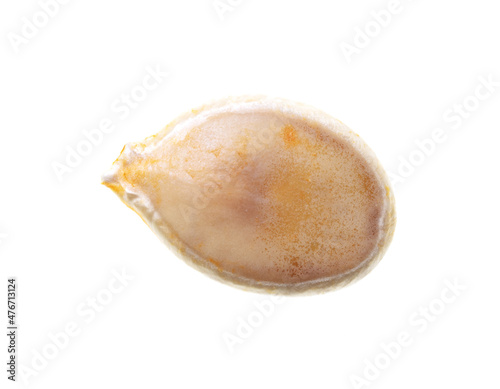 Close-up of pumpkin seeds on a white background.