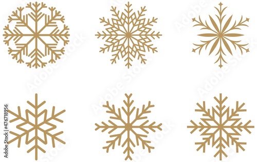 Goldene frostige abstrakte Schneeflocken Symbol set auf einem weissen Hintergrund.
Gold Schneeflocken Icons als Vektor.