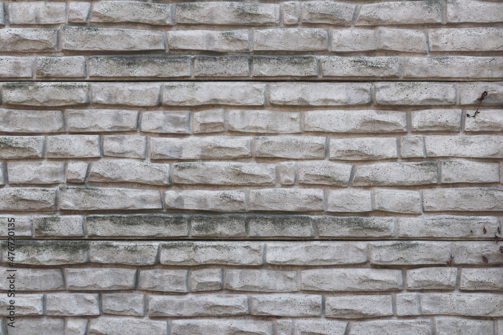 Concrete imitation of bricks on the fence. Texture Concrete imitation of bricks on the fence. Texture