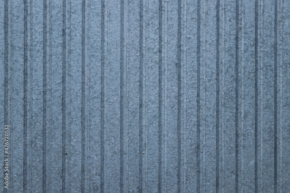 Wall surface. Aluminum blue plates. Textured coating Wall surface. Aluminum blue plates. Textured coating