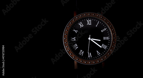 Luxury men's watches on a black background. Stock photo of the watch