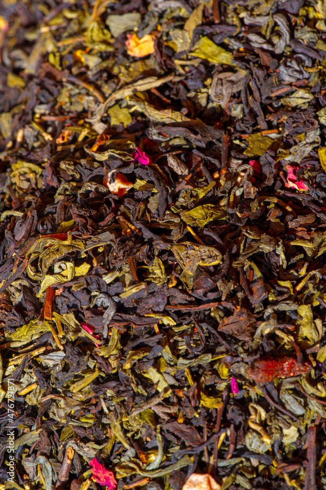 Dried tea with aromatic additives, a hot drink made by infusing the dried, crushed leaves of the tea plant in boiling water.
